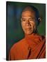 Burma, Rakhine State, A Buddhist Monk Enjoys the Late Afternoon at Sittwe, Myanmar-Nigel Pavitt-Stretched Canvas