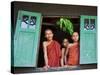 Burma, Rakhine State, Sittwe, Three Novice Monks Look Out of their Dormitory Window at the Pathain -Nigel Pavitt-Stretched Canvas