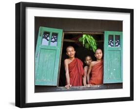 Burma, Rakhine State, Sittwe, Three Novice Monks Look Out of their Dormitory Window at the Pathain -Nigel Pavitt-Framed Photographic Print