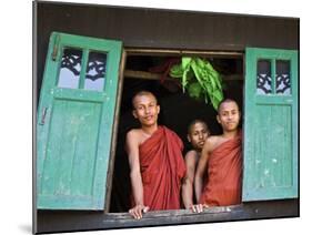 Burma, Rakhine State, Sittwe, Three Novice Monks Look Out of their Dormitory Window at the Pathain -Nigel Pavitt-Mounted Photographic Print