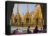 Burma, Yangon, Devout Buddhists Pray at the Shwedagon Golden Temple, Myanmar-Nigel Pavitt-Stretched Canvas