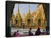 Burma, Yangon, Devout Buddhists Pray at the Shwedagon Golden Temple, Myanmar-Nigel Pavitt-Stretched Canvas