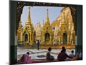 Burma, Yangon, Devout Buddhists Pray at the Shwedagon Golden Temple, Myanmar-Nigel Pavitt-Mounted Photographic Print