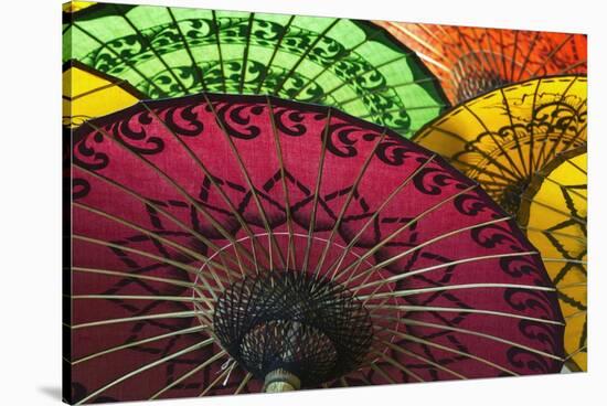 Burmese Parasols-Jon Hicks-Stretched Canvas