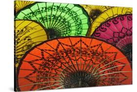 Burmese Parasols-Jon Hicks-Stretched Canvas