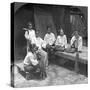 Burmese Women Smoking Outside their Home, Mandalay, Burma, 1908-null-Stretched Canvas