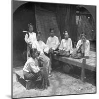 Burmese Women Smoking Outside their Home, Mandalay, Burma, 1908-null-Mounted Photographic Print
