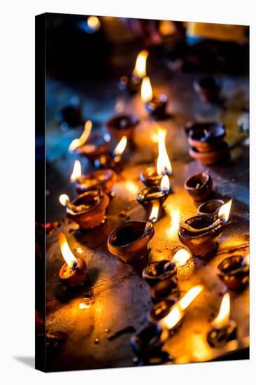 Burning Candles in the Indian Temple during Diwali, The Festival of Lights-Andrey Armyagov-Stretched Canvas