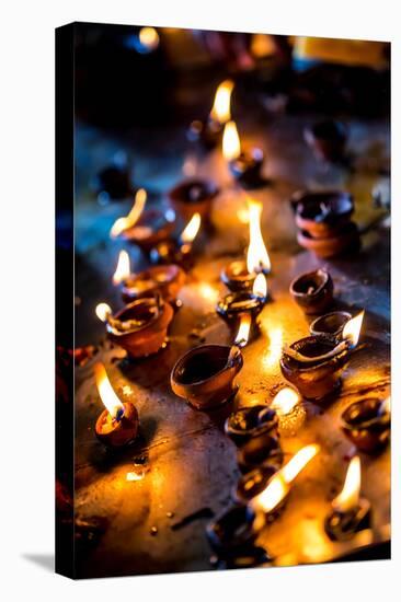 Burning Candles in the Indian Temple during Diwali, The Festival of Lights-Andrey Armyagov-Stretched Canvas