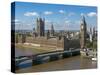 Buses Crossing Westminster Bridge by Houses of Parliament, London, England, United Kingdom, Europe-Walter Rawlings-Stretched Canvas