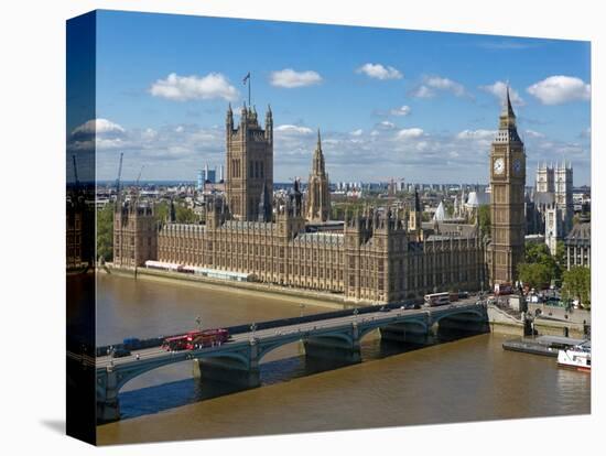 Buses Crossing Westminster Bridge by Houses of Parliament, London, England, United Kingdom, Europe-Walter Rawlings-Stretched Canvas