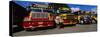 Buses Parked in a Row at a Bus Station, Antigua, Guatemala-null-Stretched Canvas