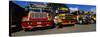 Buses Parked in a Row at a Bus Station, Antigua, Guatemala-null-Stretched Canvas