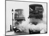 Buses Pass Through Smoke Screens-null-Mounted Photographic Print