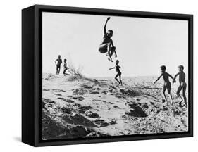 Bushman Children Playing Games on Sand Dunes-Nat Farbman-Framed Stretched Canvas