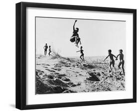 Bushman Children Playing Games on Sand Dunes-Nat Farbman-Framed Photographic Print