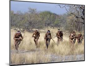 Bushman Hunter-Gatherers Makes Stealthy Approach Towards an Antelope, Bows and Arrows at Ready-Nigel Pavitt-Mounted Photographic Print