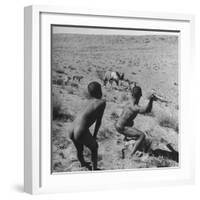 Bushman Throwing His Spear at a Winded Gemsbok-Nat Farbman-Framed Photographic Print