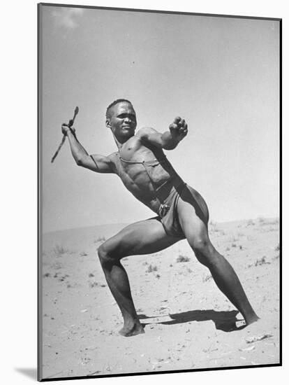 Bushman Throwing His Spear at a Winded Gemsbok-null-Mounted Photographic Print