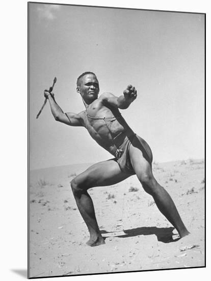 Bushman Throwing His Spear at a Winded Gemsbok-null-Mounted Photographic Print