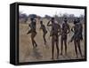 Bushmen or San Hunter-Gatherers Pause to Check a Distant Wild Animal in the Early Morning, Namibia-Nigel Pavitt-Framed Stretched Canvas