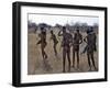 Bushmen or San Hunter-Gatherers Pause to Check a Distant Wild Animal in the Early Morning, Namibia-Nigel Pavitt-Framed Photographic Print