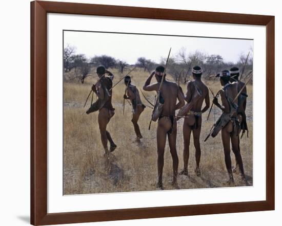 Bushmen or San Hunter-Gatherers Pause to Check a Distant Wild Animal in the Early Morning, Namibia-Nigel Pavitt-Framed Photographic Print