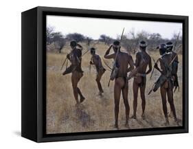 Bushmen or San Hunter-Gatherers Pause to Check a Distant Wild Animal in the Early Morning, Namibia-Nigel Pavitt-Framed Stretched Canvas