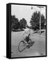 Business Man Riding Bicycle-Philip Gendreau-Framed Stretched Canvas