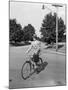 Business Man Riding Bicycle-Philip Gendreau-Mounted Photographic Print