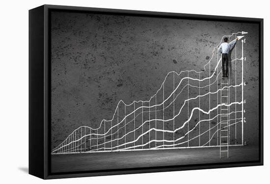 Businessman Drawing Graphics on Wall-Sergey Nivens-Framed Stretched Canvas