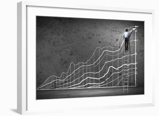 Businessman Drawing Graphics on Wall-Sergey Nivens-Framed Photographic Print