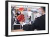 Businessman Holding Red Envelopes and Coworkers Hanging Decorations for Chinese New Year-XiXinXing-Framed Photographic Print