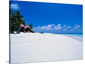 Businessman on Beach, Maldives-Stuart Westmorland-Stretched Canvas