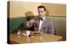 Businessman Pouring Syrup on Pancakes-William P. Gottlieb-Stretched Canvas