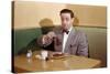 Businessman Pouring Syrup on Pancakes-William P. Gottlieb-Stretched Canvas