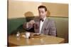 Businessman Pouring Syrup on Pancakes-William P. Gottlieb-Stretched Canvas