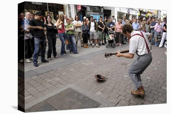 Busker Entertaining the Crowds, Galway, County Galway, Connacht, Republic of Ireland-Gary Cook-Stretched Canvas