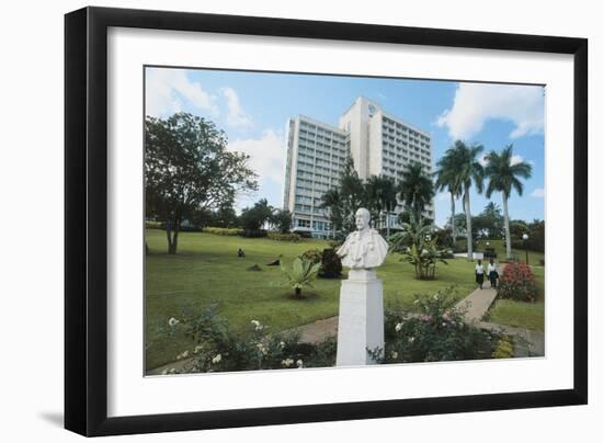 Bust of George V, Jubilee Park, on the Background the Sheraton Hotel, Uganda, Kampala-null-Framed Giclee Print