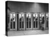 Busy Telephone Booths During an Airline Strike-Robert W^ Kelley-Stretched Canvas