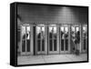 Busy Telephone Booths During an Airline Strike-Robert W^ Kelley-Framed Stretched Canvas