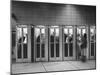 Busy Telephone Booths During an Airline Strike-Robert W^ Kelley-Mounted Photographic Print