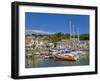 Busy Tourist Shops, Small Boats and Yachts at High Tide in Padstow Harbour, North Cornwall, England-Neale Clark-Framed Photographic Print