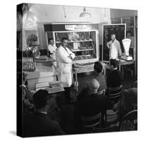 Butcher from Danish Bacon Giving a Demonstration, Kilnhurst, South Yorkshire, 1961-Michael Walters-Stretched Canvas