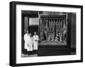 Butchers Standing Next to their Shop Window Display, South Yorkshire, 1955-Michael Walters-Framed Photographic Print