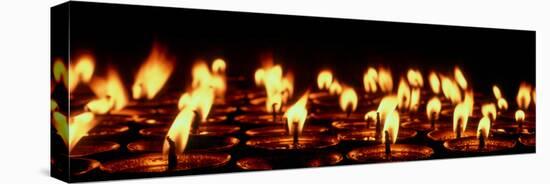Butter lamps lit for the sacred full moon of July in Lo Manthang, Mustang Region, Nepal-null-Stretched Canvas