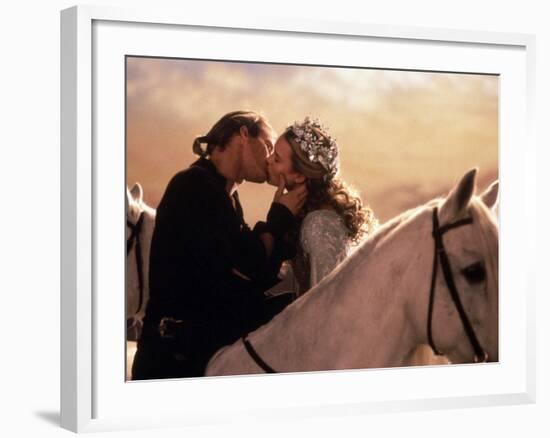 Buttercup and Westley Kissing on Horseback-null-Framed Photo