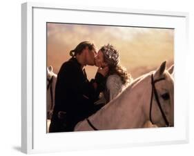 Buttercup and Westley Kissing on Horseback-null-Framed Photo