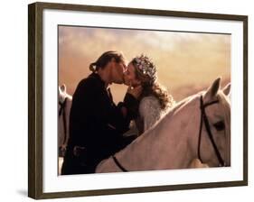 Buttercup and Westley Kissing on Horseback-null-Framed Photo