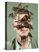 Butterfly Breeder Carl Anderson with Monarch Butterflies on His Face-John Dominis-Stretched Canvas